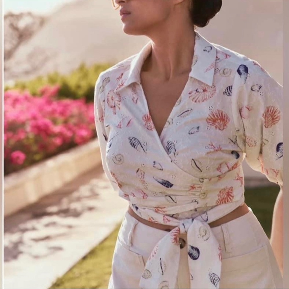 Anthropologie Maeve sea shell wrap top
